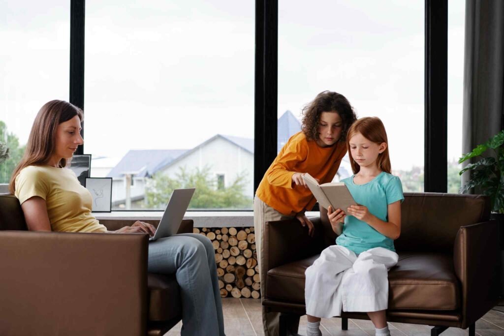 A family relaxing securely at home, benefiting from peace of mind with Homebuyer Life Insurance UK.